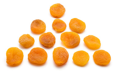 Triangle of dried apricots isolated on white background
