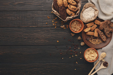 Oatmeal cookies and baking ingredients for homemade pastry background