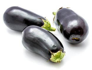 Three whole eggplants (aubergine) isolated on white background