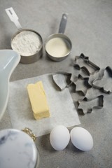 High angle view of pastry cutters with ingredients