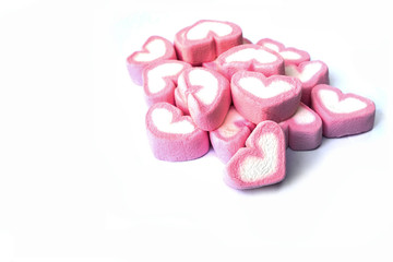 Fototapeta na wymiar Heart shaped marshmallows isolated