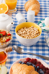 Continental breakfast menu on checkered cloth