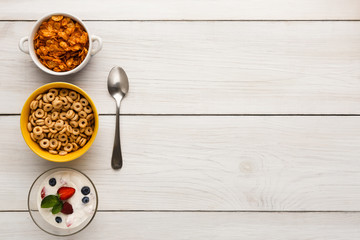 Healthy breakfast meals on wooden table copy space