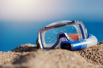 Mask for swimming on the beach sand.