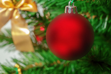 Obraz na płótnie Canvas Christmas tree with ornaments, close-up