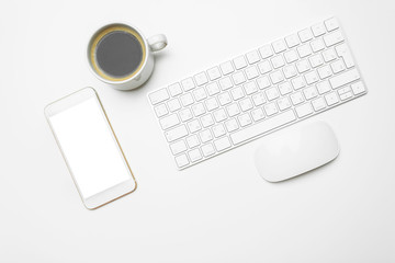 Office desk table with computer, supplies and coffee cup