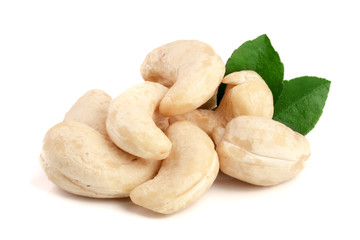 cashew nuts with leaf isolated on white background. macro