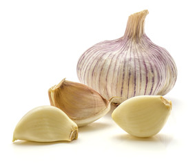 One garlic bulb and three cloves isolated on white background
