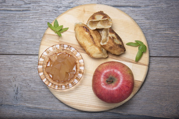Ripe apple, jam, pies with jam