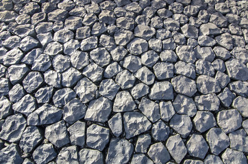background and texture of granite stone wall surface