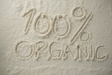 Organic text with 100 percentage sign on flour