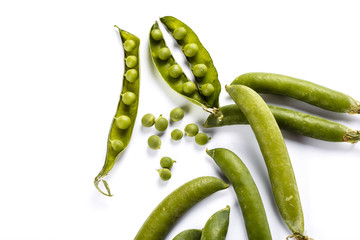 fresh green peas isolated on a white background..