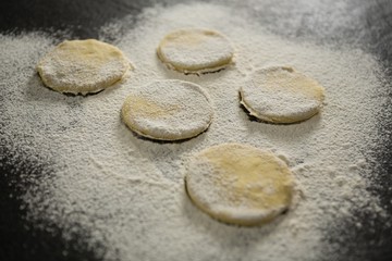 Fototapeta na wymiar Flour on unbaked cookies