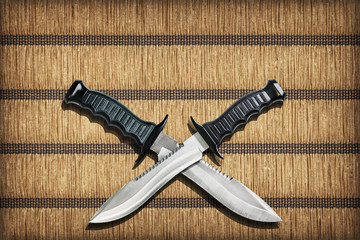 Two Crossed Blades Tactical Combat Hunting Survival Sawback Bowie Knives Set On Yellow Plaited...