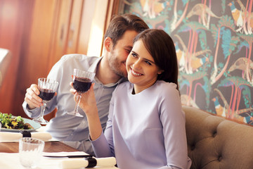 Romantic couple dating in restaurant