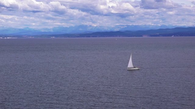 Sailing boat on seascape. Summer activity on sea. Seaside leisure time and enjoyment.