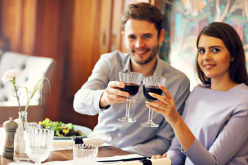Romantic couple dating in restaurant