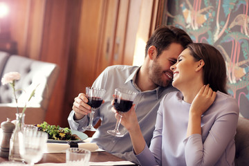 Romantic couple dating in restaurant