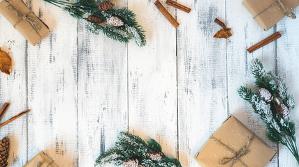 Christmas gifts on a white wooden background