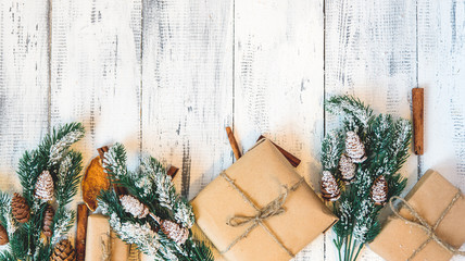 Christmas gifts on a white wooden background