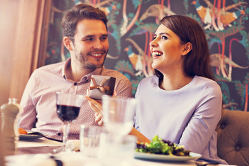 Romantic couple dating in restaurant
