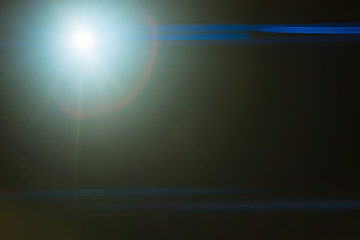 The bright light on the dark background. anamorphic lens shot