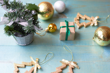 Fototapeta na wymiar Christmas tree decorations on a wooden background. Preparing for Christmas
