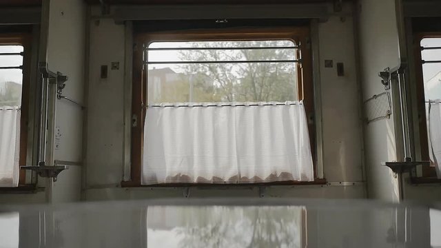 Empty passenger train car in Russia in a state of motion