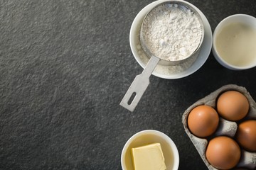 Directly above shot of ingredient by egg carton