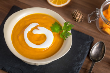 Creamy pumpkin soup with vegetables and spices.