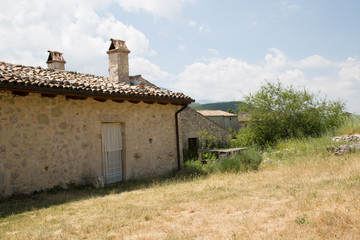Ancient restored houses in an abandoned mountain village, Central Italy 