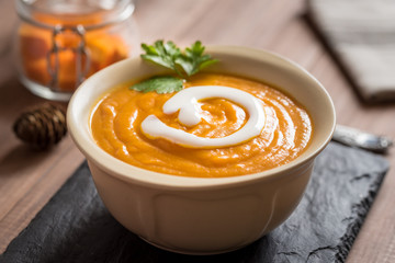 Creamy pumpkin soup with vegetables and spices.