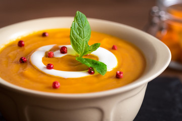 Creamy pumpkin soup with vegetables and spices.
