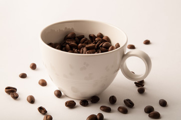 White coffee cup and roasted coffee beans wall art