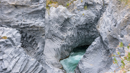 Basalt rocks formations of the gorge of Alcantara river