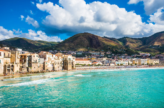 Beautiful bay of Cefalu town, panoramic view of  harbor and old houses in Cefalu, province of Palermo, Sicily. 