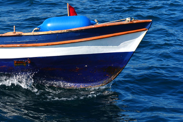 Fototapeta premium Lonely nose of a fishing boat at the sea