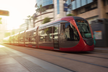a tram passing in the streets of casablanca, moroco