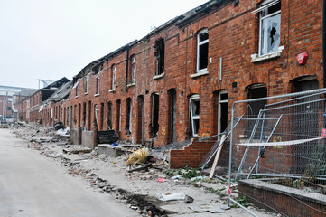 Derelict terraced houses ready to be demolished to make way for new homes