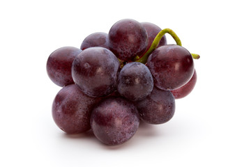 Ripe red grape isolated on white.