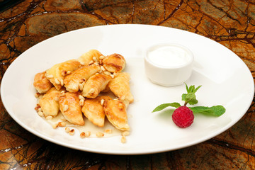 Dumplings, pelmeni, ravioli - On a white plate