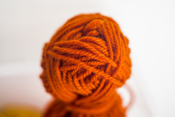 Ηand Κnitting Υarn, close up macro shot