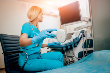 Doctor and little boy patient. Ultrasound equipment. Diagnostics. Sonography.