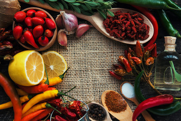 chili pepper, Various spices on old wooden, room for text. toned image. 