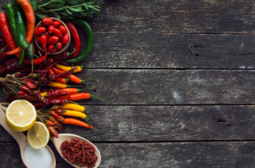 chili pepper, Various spices on old wooden, room for text. toned image. 