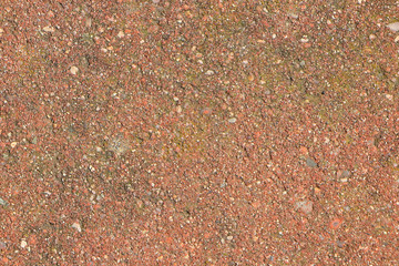 Close up of red - black granite texture with small stones