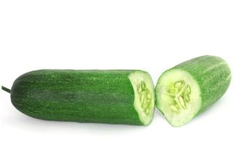 fresh green cucumber half broken isolate on white background