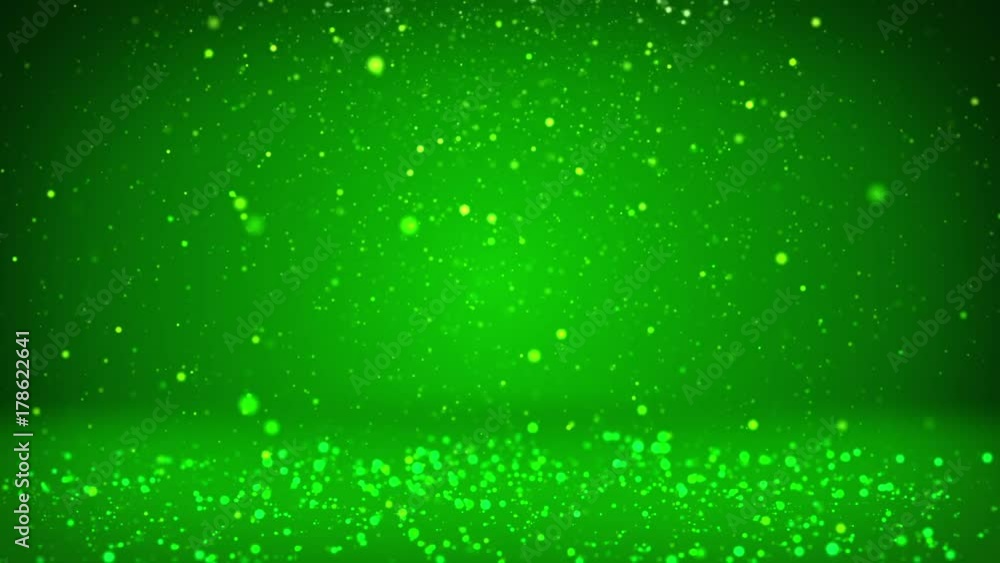 Poster shiny green particles or glitters fall and settle on the surface. background or place for your objec