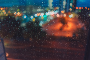 Fototapeta na wymiar Rainy city at night