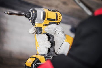 Worker with Drill Driver